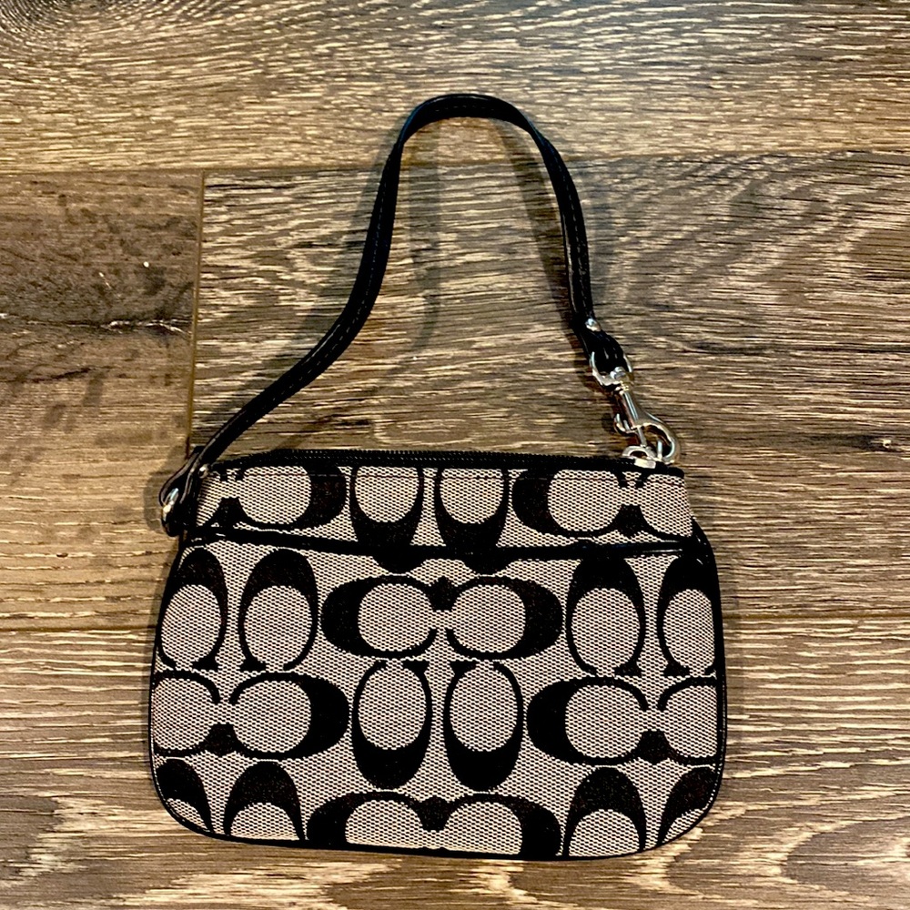 Coach wristlet, black and white, excellent condition